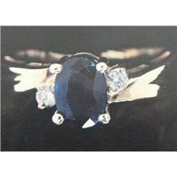 14 K Yellow Gold Sapphire Lady's Ring accented with Diamonds.  Sapphire Approx 0.75 carats, Diamonds