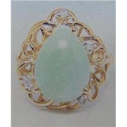 14 K Yellow Gold Jade Lady's Ring accented with Diamonds.  Jade is 13.00mm x 9.50mm.  Diamonds Appro