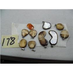 Lot of: Fossilized Ivory Pendants  9