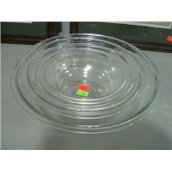 NEST OF FOUR CLEAR GLASS PYREX BOWLS (BOWL #3 HAS SOME MINOR ROUGHNESS)