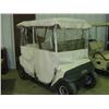 Image 1 : E-Z-GO GOLF CART; GAS POWERED WITH CANVAS COVER (SOME TEARS IN SEAT); EXTRA TIRE & WHEEL