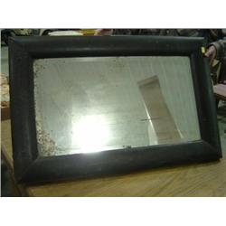 BEVELED GLASS MIRROR WITH WOODEN FRAME; SHOWING WEAR