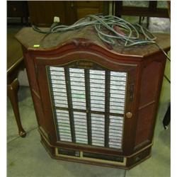 CONSULETT JUKE BOX WITH 45 RECORDS; AS IS