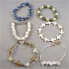 Image 1 : Set of 6 Gemstone Bracelets - Lapis Lazuli, Hematite, Quartz, Howlite, Fossil