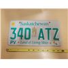 Image 1 : Saskatchewan license plate "Land of Living Skies" wheat sheath + lily 340-ATZ