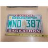 Image 1 : Saskatchewan wheat sheath license plate WND-387 w/ Saskatoon license plate frame