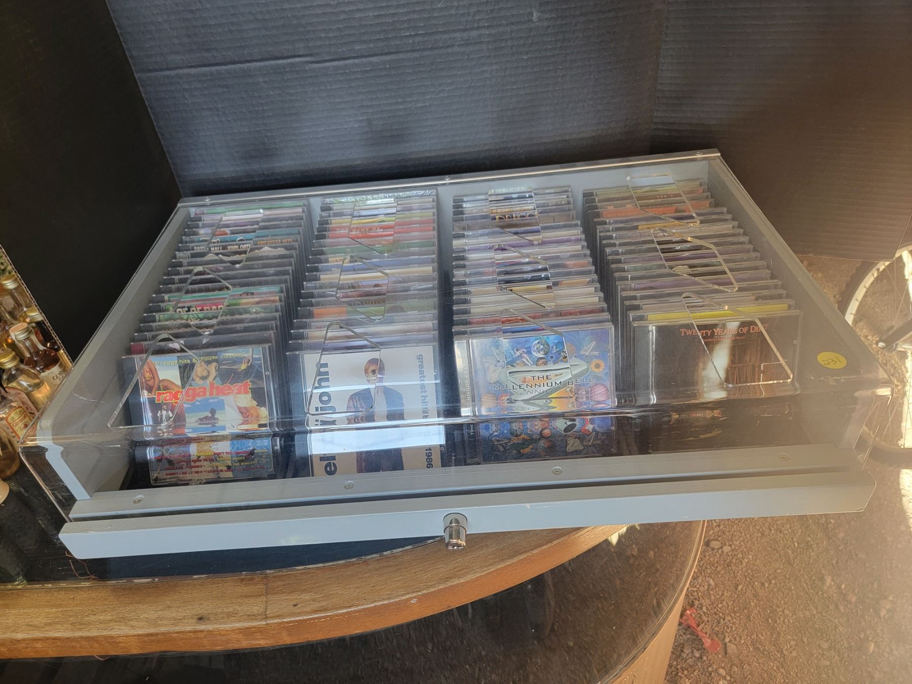 locking CD case filled w/ assorted CD's - see photos - Schmalz Auctions