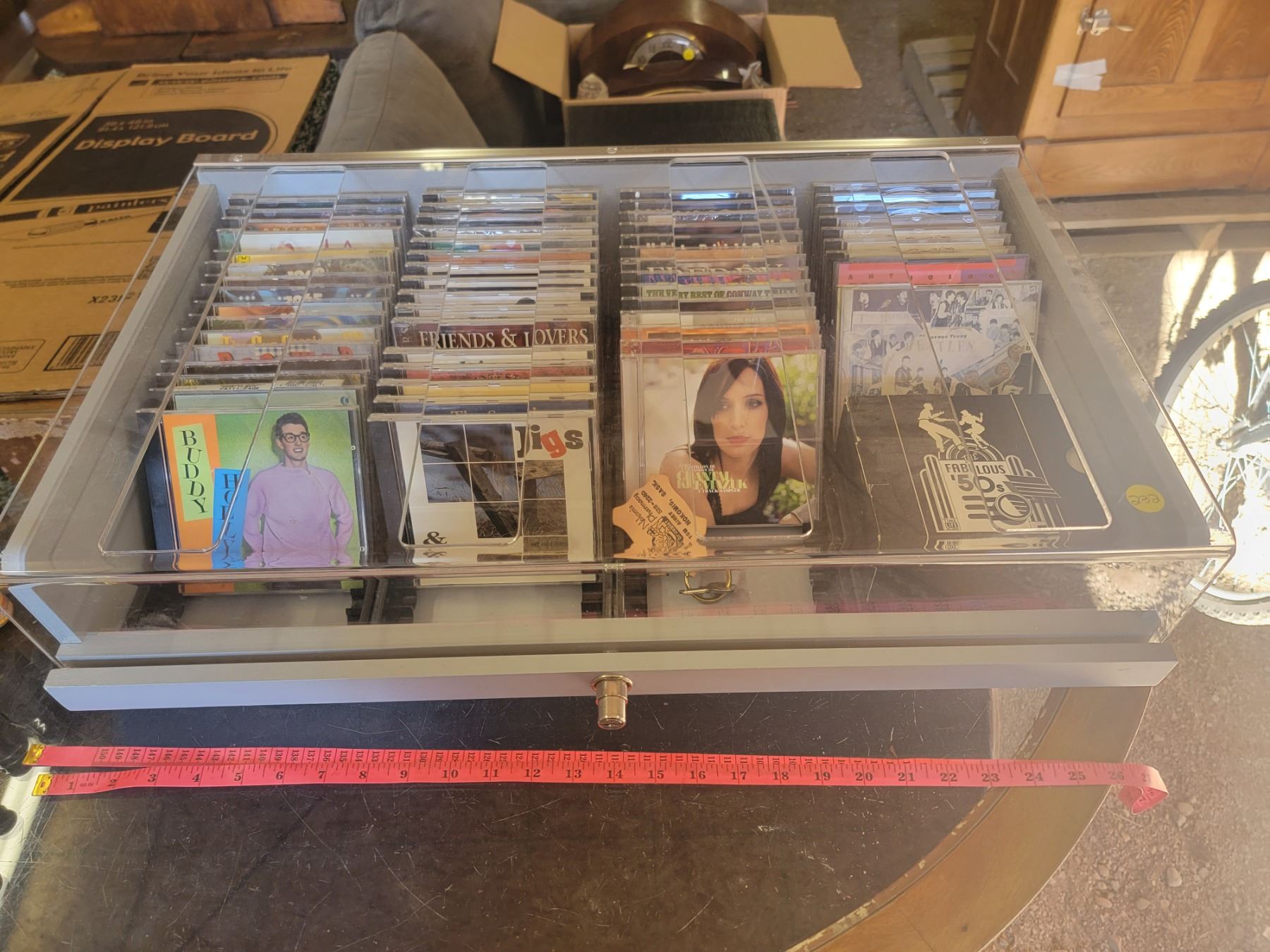 locking CD case filled w/ assorted CD's - see photos - Schmalz Auctions
