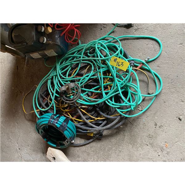 Heavy ext. cord, hose, charger, compressor, creeper, red rolling cabinet c/w contents