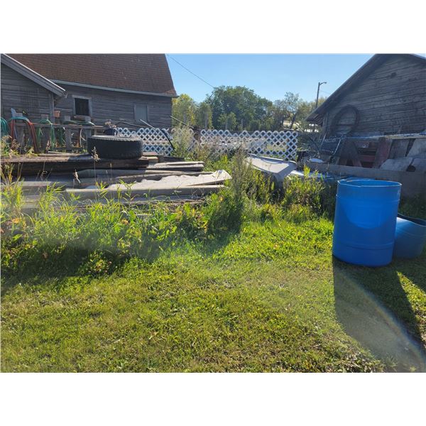 Lumber, posts, barrels & blue crate