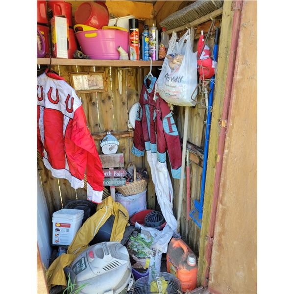 Contents inside and outside of small red shed