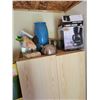 Image 2 : Contents of 2- Cabinets. Kitchenware, clothing etc. including the cabinets