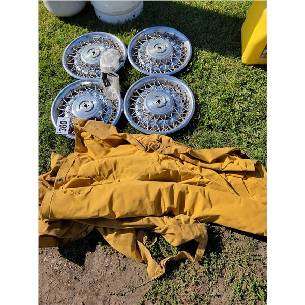 4- Caddy hubcaps & newer canvas