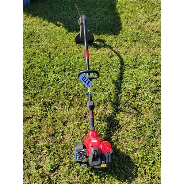 Toro gas weed eater (looks like new, starts and stalls)