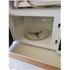 Image 3 : Microwave stand, Danby microwave c/w contents, décor, spices, 2- phones, pens etc.