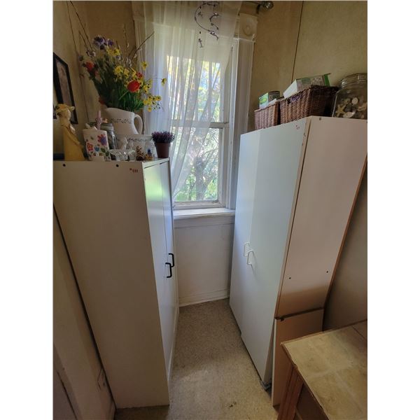 2- White storage cabinets c/w with décor & contents