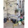 Image 1 : Qty of lawn ornaments, rakes, brooms, dog house, barrel and misc.