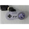 Image 3 : Super Nintendo and GameCube Controllers