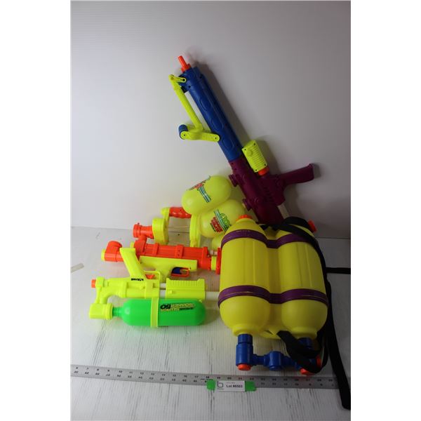 * (4) Assorted Super Soaker Water Guns