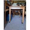 Image 2 : WOODEN TABLE ON CASTORS