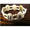 Image 1 : Beautifully Scrimshawed Ivory Bracelet with Eskimo Scenes