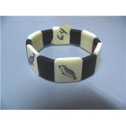 Scrimshawed Ivory and Baleen bracelet with Arctic Animals by Davis Mendaluk of Diomede, AK  c.1960