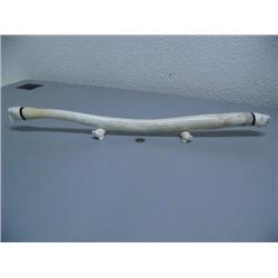 27" Oosicks Mounted on Carved Ivory Seals with Bear on one side and Walrus on other. By Vince Kannuk