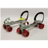 Image 1 : PAIR OF ADJUSTABLE SLIP ON ROLLER SKATES