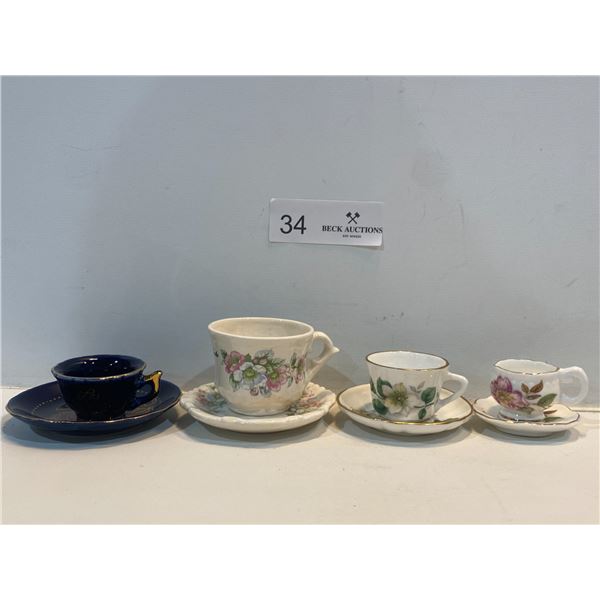 Assortment Of Miniature Tea Cups And Saucers