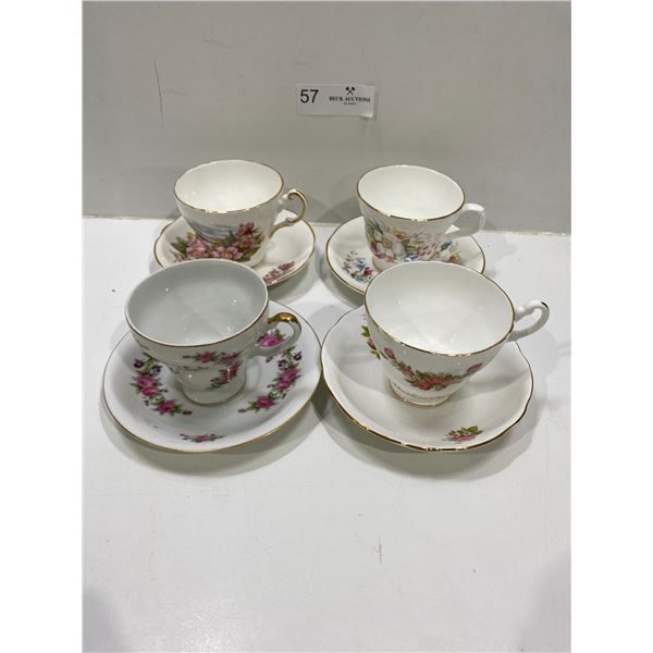 Set Of Four Tea Cups And Saucers