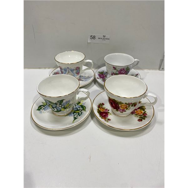 Set Of Four Tea Cups And Saucers