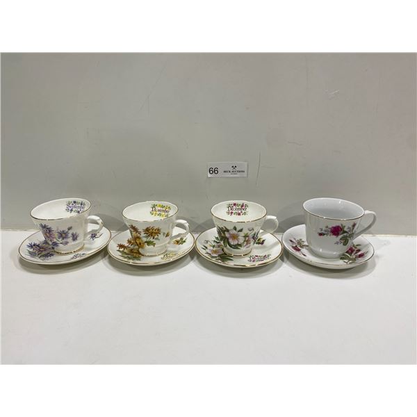 Set Of Four Tea Cups And Saucers