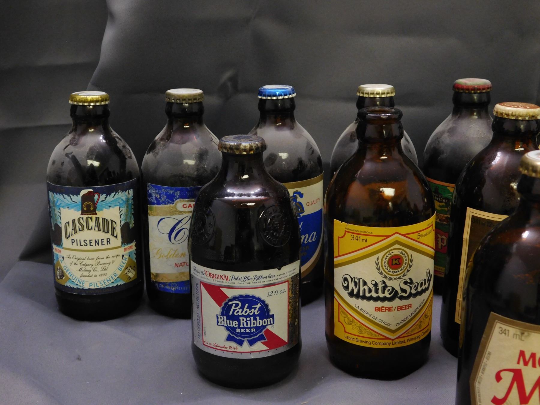 Lot of 22 Vintage Stubby Beer Bottles *most full*
