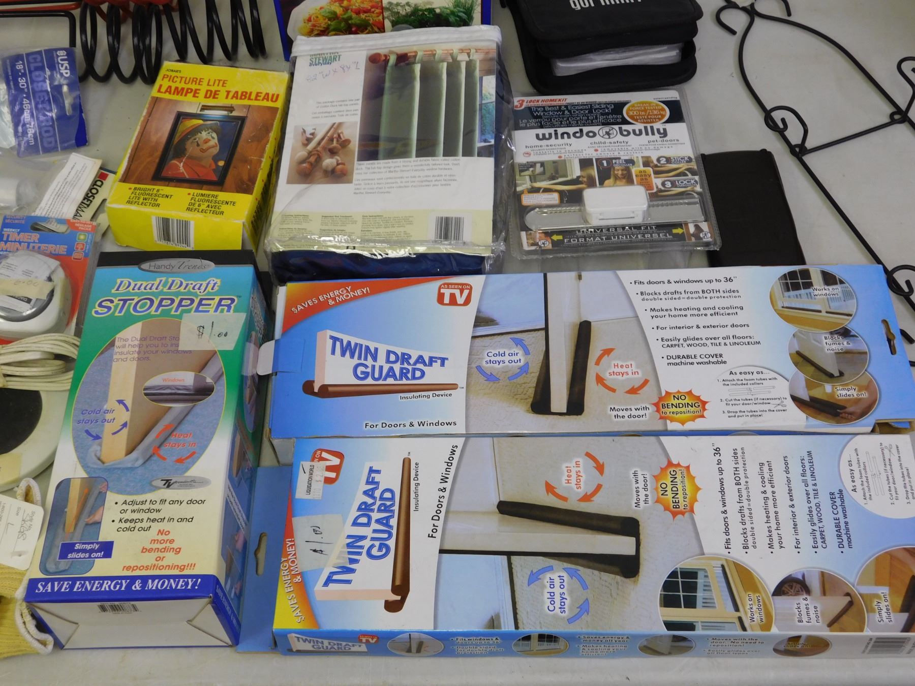 Table Full of Household Items Closet / Curtain Rods, Scale, Window ...