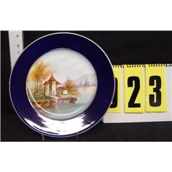 10 1/2" Limoges scenic plate, cottage on river bank