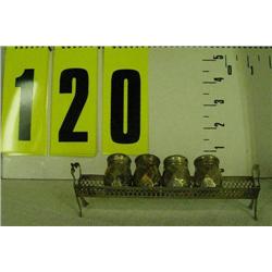 Sterling salt/pepper shakers in holder