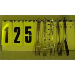 Silver - 4 forks, 1 butter knife