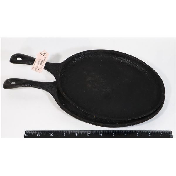 TWO OVAL CAST IRON PANS (10 X 7.5")