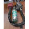 Image 1 : ANTIQUE GAS MASK AND TOM COLLINS BOTTLE