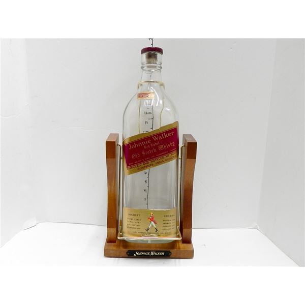 VINTAGE JOHNNIE WALKER 133 1/3 OUNCE BOTTLE ON WOODEN HOLDER