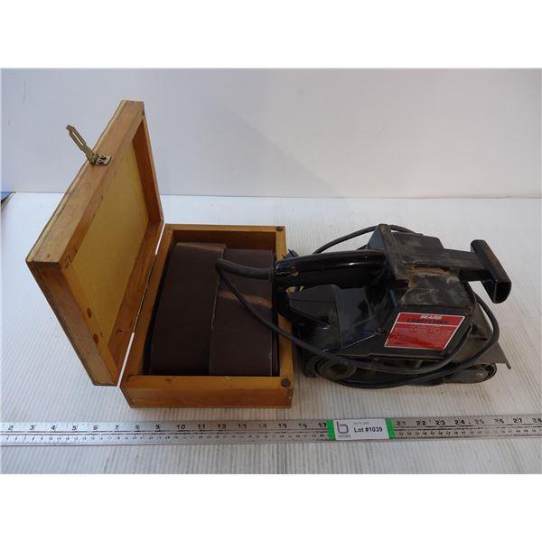 Sears Craftsman 3"x21" Belt Sander-powers on with container of sand paper