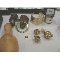 Lot of 2 African wood carved masks, wooden sock darner, napkin rings, bracelet, & miniature tea set 