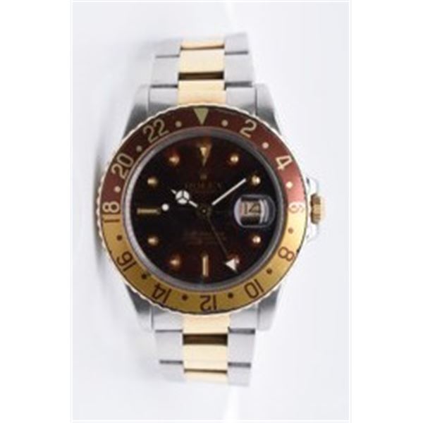 Pre-owned ROLEX GMT Model #16753 S/G 40MM