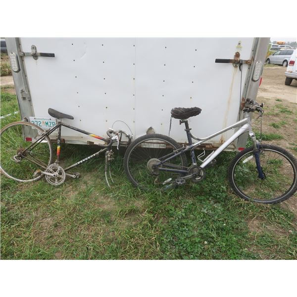 2 bicycles - 1 missing front wheel