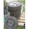 Image 1 : 5x 5-bolt rims and tires - 5x115, 4x P205/60R16 Goodyears, 1x 225/60R16 Winguard