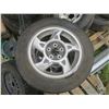 Image 2 : 5x 5-bolt rims and tires - 5x115, 4x P205/60R16 Goodyears, 1x 225/60R16 Winguard