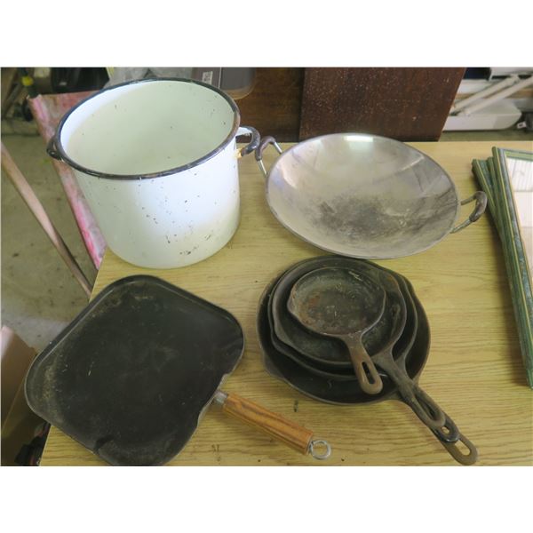 cast iron pans, pot and wok