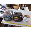 Image 1 : partial oil jugs and partial power steering fluid tin