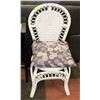 WHITE WICKER CHAIR WITH PURPLE PILLOW CUSHION