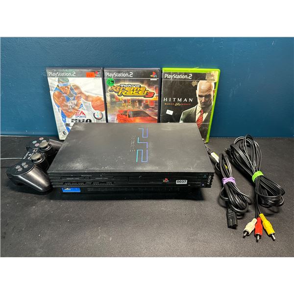 Lot of 1 Sony Playstation 2 Console - Complete with Games!